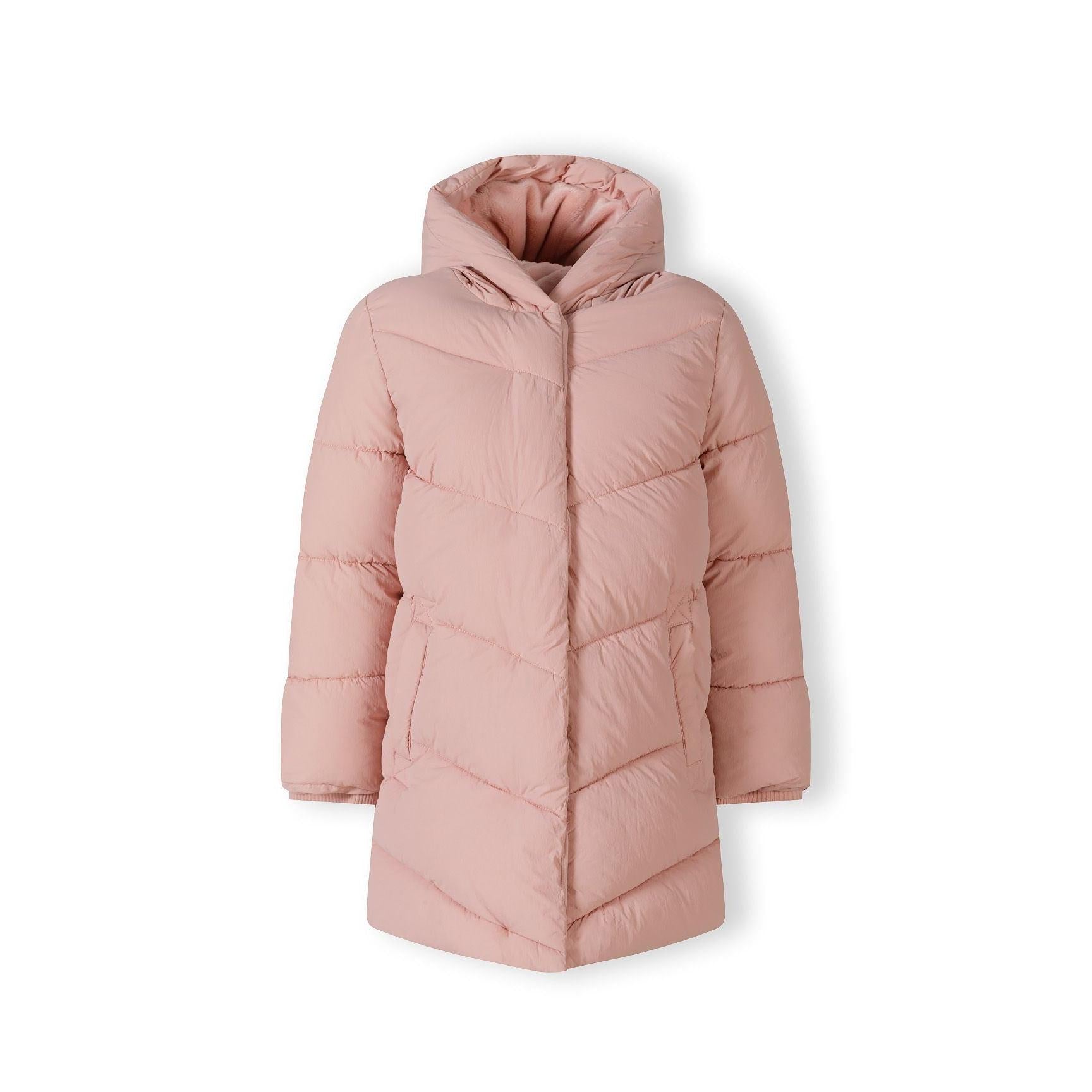 Pink long quilted jacket laid flat showing diagonal quilting pattern, hood, and front zip closure with Minoti label visible