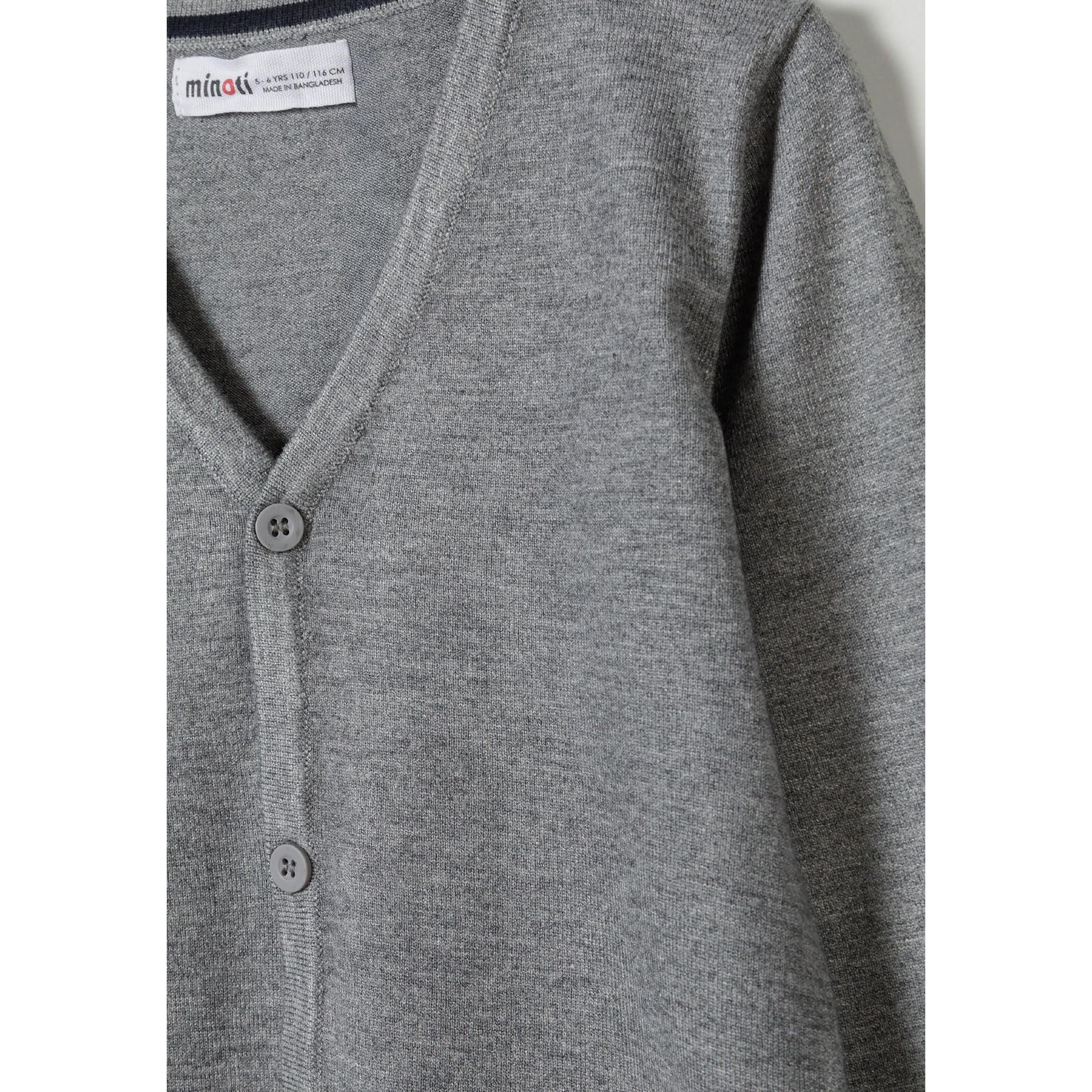 Close-up detail of grey cardigan showing Minoti label, button placket and V-neck construction with fine knit texture