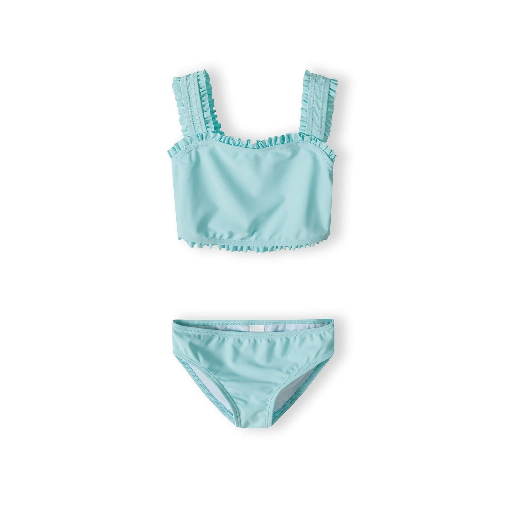 Mint green two-piece bikini set with ruffle trim straps and decorative edges, photographed flat lay style on white background