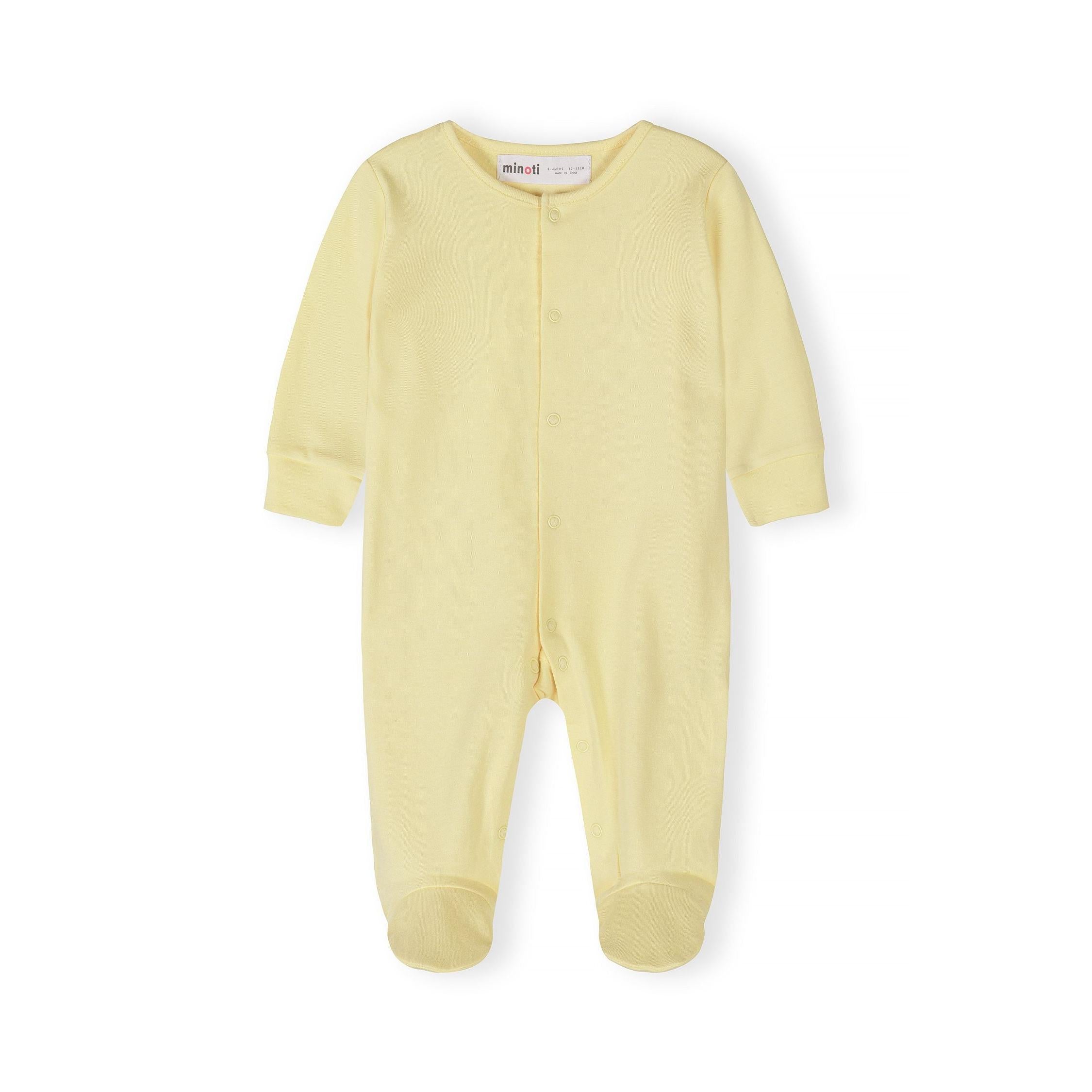 Single coral pink baby sleepsuit laid flat showing full-length snap button closure and Minoti label on white background