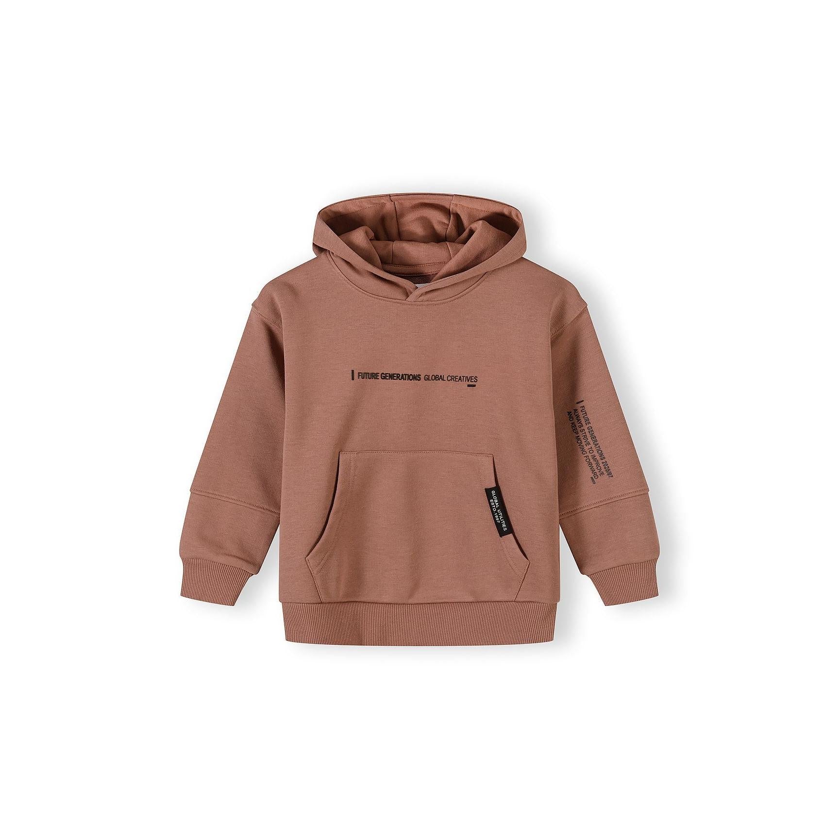 Front view of cognac tracksuit joggers showing elastic waistband with drawstring and text print on leg