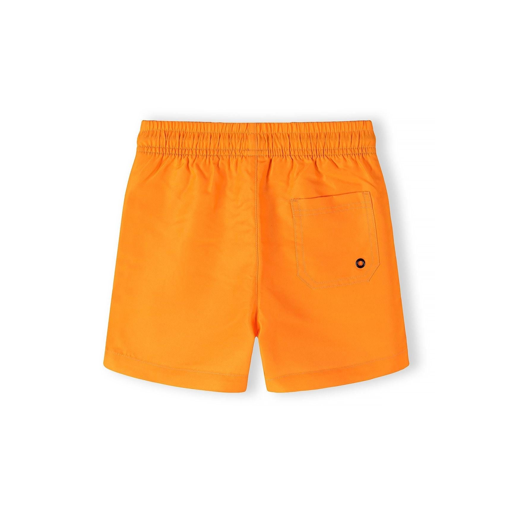 Single navy blue swim shorts with orange contrast waistband lining and drawstring ties on white background
