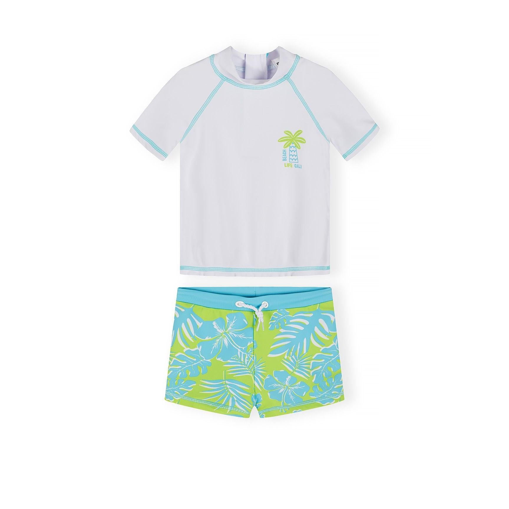 White rash vest with aqua contrast stitching and tropical palm tree graphic, paired with lime green shorts featuring hibiscus and palm leaf print, displayed on white background