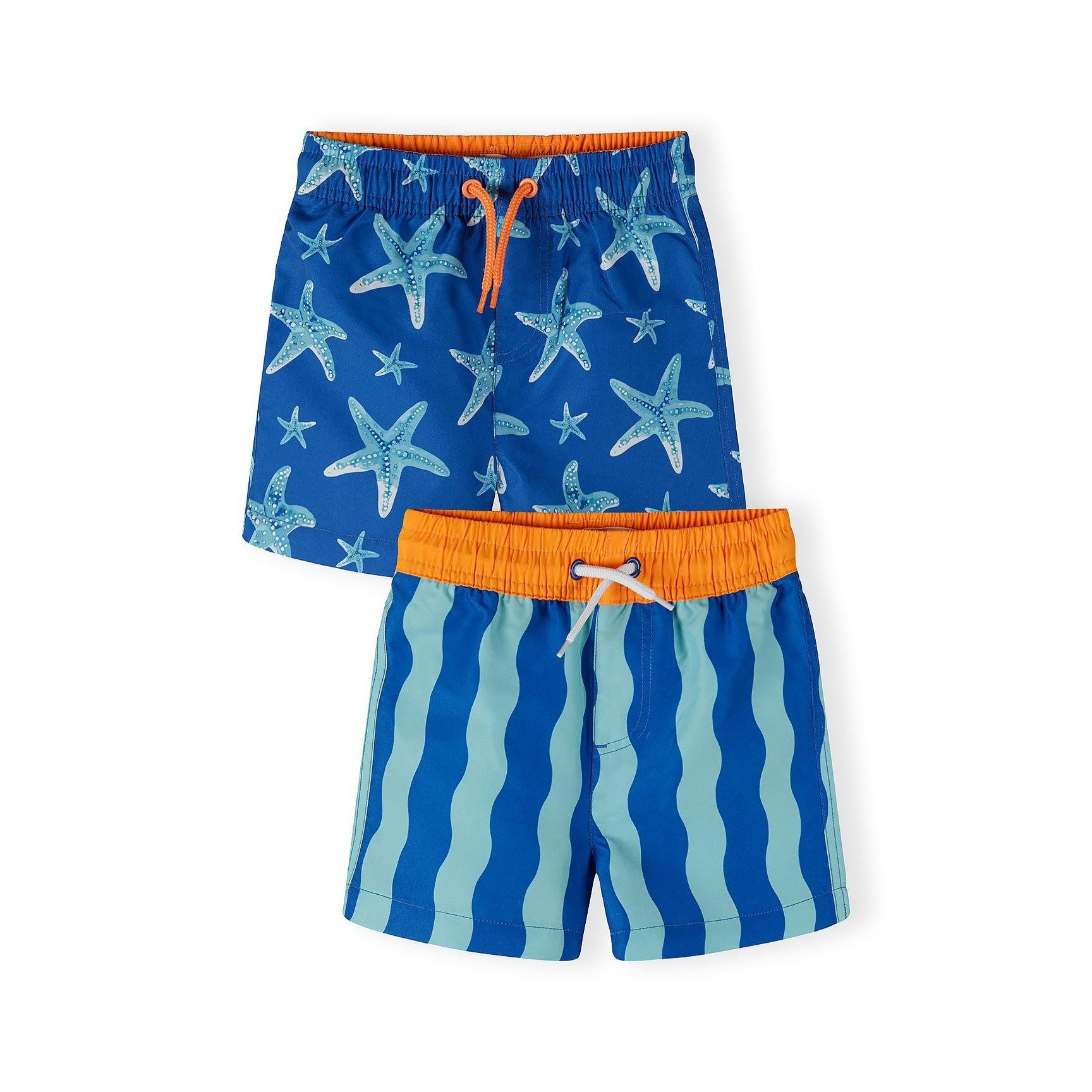Two boys swimming shorts laid flat - one royal blue with white starfish print and orange waistband, one with blue wavy stripes and orange waistband on white background