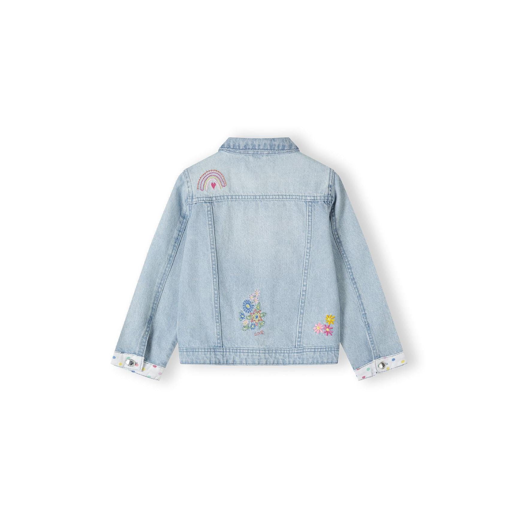 Back view of light blue denim jacket showing embroidered rainbow and floral designs on white background