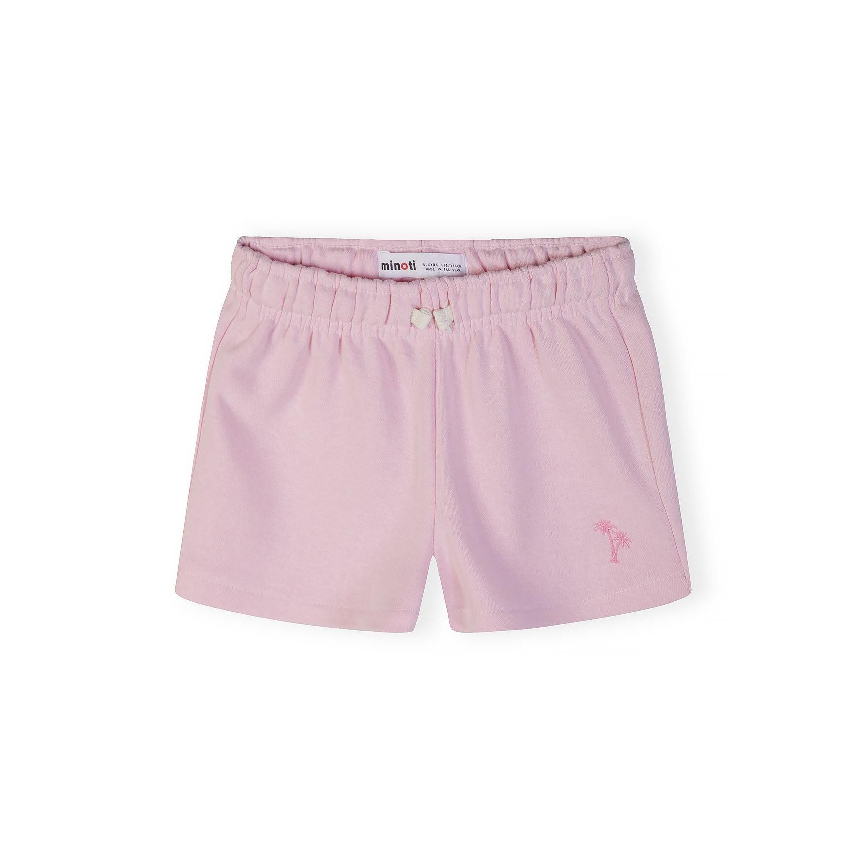 Single pink shorts with elastic waistband, white drawstring bow and small pink palm tree embroidery on leg against white background