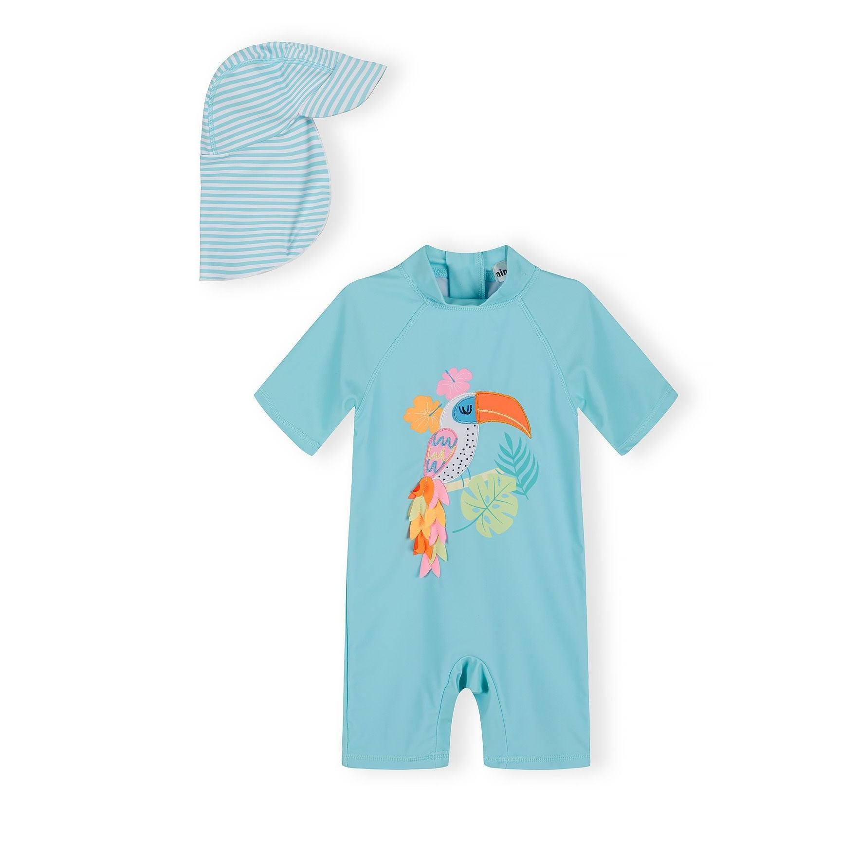Turquoise swimsuit with colorful tucan print and matching striped sun hat displayed on white background