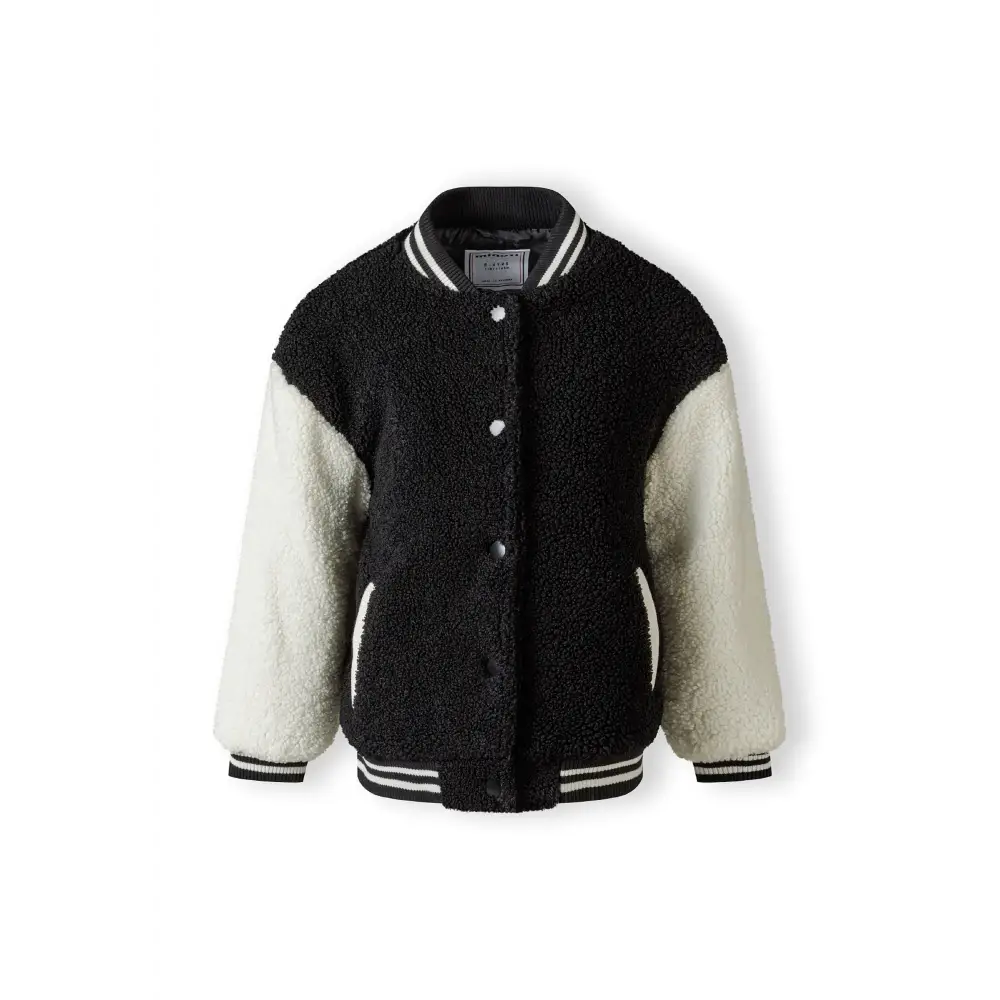 Back view of black borg baseball jacket with cream sleeves and striped ribbed collar on white background
