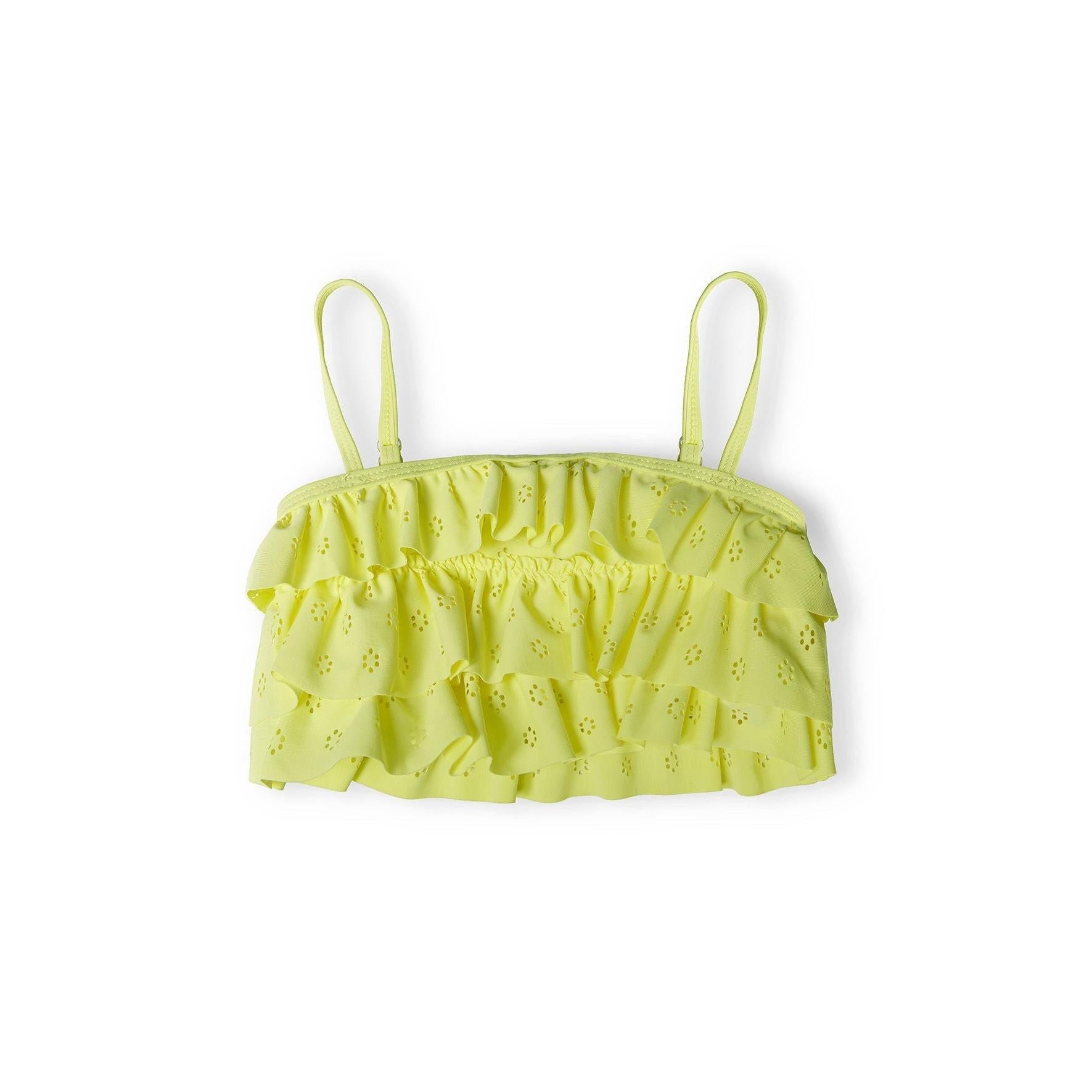 Close-up view of yellow broderie anglaise bikini top showing detailed ruffled trim and adjustable shoulder straps on white background