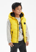 Boys yellow padded gilet, front view, featuring a chest badge and front zip.