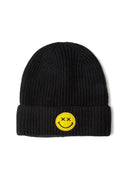 Black knitted beanie with ribbed texture and yellow smiley badge, front view.