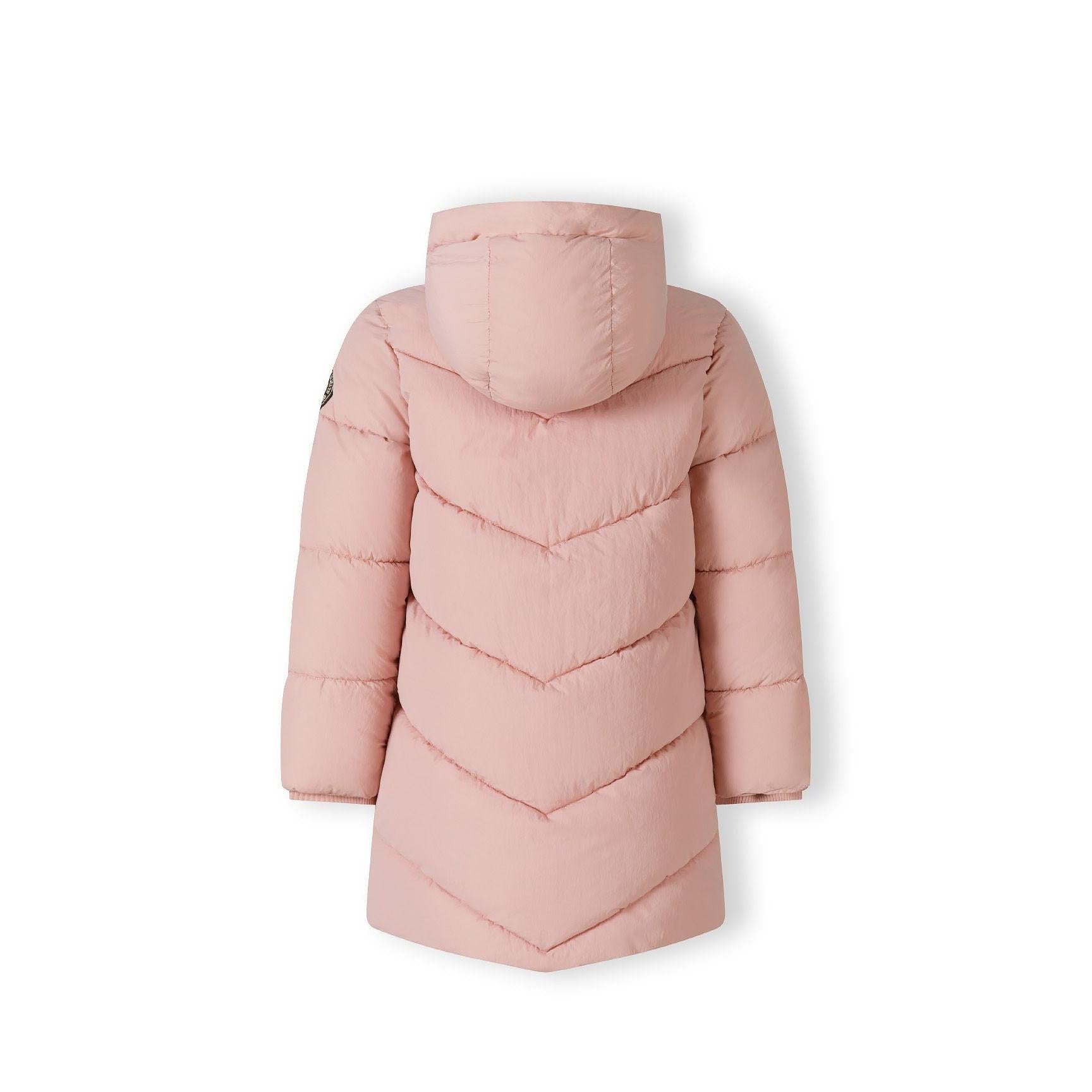 Close-up detail of pink quilted jacket showing side pocket with zip closure and diagonal stitching pattern