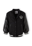 Boys baseball jacket in black, front view with button fastening and ribbed cuffs.