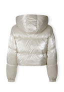 Back view of a cropped metallic padded jacket in cream with a hood.