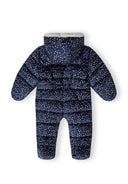 Baby unisex snowsuit in navy, back view with attached mitts and floral print.