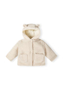 Baby teddy jacket with hood, buttons, and two patch pockets, cream, front view.