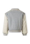 Girls baseball style jacket with faux leather sleeves grey 2-14y showing back design with striped collar and cuffs in kids fashion style