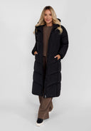 Women long black quilted winter jacket with drawstring hood and contrasting zip, front view.
