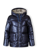 Front view of a navy quilted short hooded jacket with zip and flap pockets.
