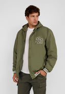 Men's khaki baseball jacket with detachable hood, ribbed cuffs, and embroidered logo.