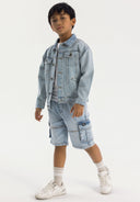Boys light blue denim jacket, front view, with button closure and chest pockets.