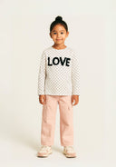 Girls long sleeved top with applique slogan multicoloured 1-8y featuring a textured 'LOVE' applique on a spotty print.