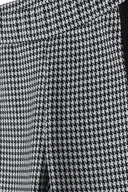 Girls leggings dogtooth with side panels black 3-14y featuring soft knitted jacquard fabric and elasticated waistband.  