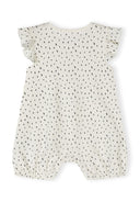 Girls rompers with frill sleeves cream 0-24m featuring frill sleeves and playful black dots on a cream background. Complements warm weather wear.