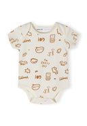 Light cream short sleeve bodysuit with playful prints and press studs at the crotch.