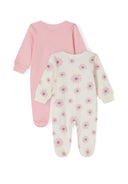 Two long-sleeved sleepsuits for girls, one light pink and one floral, back view.