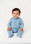 Boys sleepsuits 2 pack long sleeve with feet beige 0-24m. Features a playful blue pattern with fun text. Soft cotton blend material for comfort.