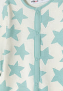 Detail of a mint long sleeve sleepsuit for boys with star pattern and front press stud fastening.