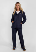 Women’s navy waterproof overpants, front view, featuring elastic waistband and side openings.