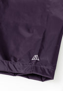 Purple waterproof overpants with adjustable cuffs featuring a sleek design. Ideal for women in sizes 36-48.