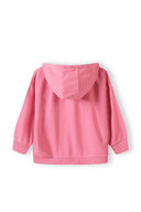Back view of a girls oversized zip through hoodie in pink with a hood and ribbed cuffs.