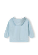 Back view of a girls oversized blue hoodie with a hood and ribbed cuffs.