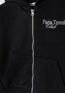 Close-up of a black oversized zip-through hoodie for girls, featuring a front pocket and decorative embroidery.
