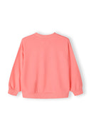 Back view of a coral girls fleece crew neck sweatshirt with ribbed cuffs.