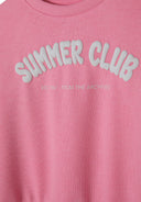 Close-up of a pink girls fleece crew neck sweatshirt with 'SUMMER CLUB' print.