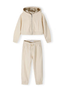 Cropped beige zip hoodie and jogger set for girls, featuring a hood and side pockets.