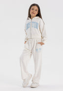 Cropped zip-through hoodie with kangaroo pocket and wide leg joggers, cream.