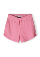 Detail of pink shorts with two pockets and elasticated waistband.