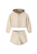 Girls lightweight beige zip-through hoody with matching shorts, featuring ribbed cuffs and pockets.