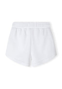 Detail of white shorts with elasticated waistband and rounded edges.