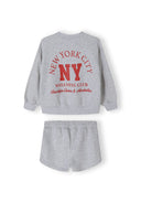 Girls grey crew neck sweatshirt and shorts set, back view, features printed logo and side pockets.