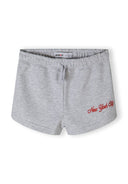 Detail of grey shorts with elastic waistband and 'New York City' embroidery.