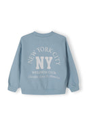 Back view of a blue girls' crew neck sweatshirt featuring a printed design.