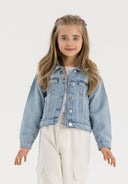 Girls oversized light blue denim jacket, front view with button fastening and chest pockets.