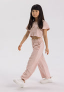 Girls' pink blouse and wide-leg trousers set, front view, featuring flared sleeves and elasticated waistband.