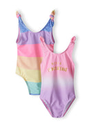 Two girls' one-piece swimsuits in purple and pastel colors, featuring knotted straps.